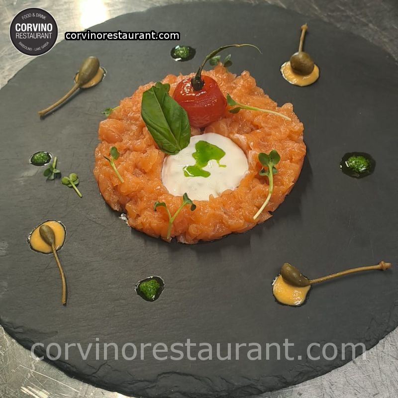 Salmon tartare with stracciatella and basil oil Salmon tartare with stracciatella and basil oil